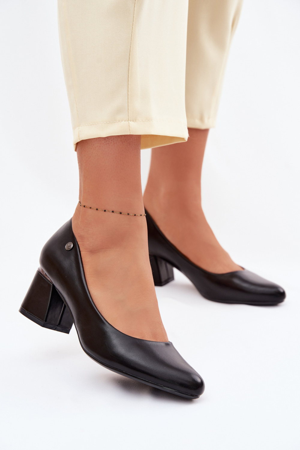 Pumps met dikke hak Step in style